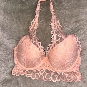 Victoria’s Secret halter bra, 
Size hard to read-fits 34B/C
Excellent Condition.